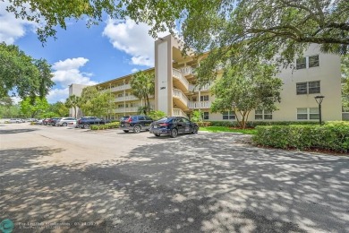Priced under market! Well maintained 1 bed, 1.5 bath condo in on Wynmoor Golf Course in Florida - for sale on GolfHomes.com, golf home, golf lot