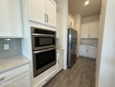 Welcome to the Flamingo Model Home by Jones Homes USA! This on LPGA International Golf Course in Florida - for sale on GolfHomes.com, golf home, golf lot