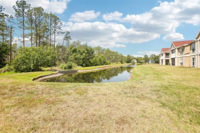 Under contract-accepting backup offers. Charming 3 bedroom, 2 on Hunters Green Country Club in Florida - for sale on GolfHomes.com, golf home, golf lot
