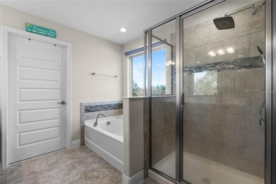 Stunning 4BD/3.5BA Pool Home with Tesla Solar System on an on Orange County National Golf Center and Lodge in Florida - for sale on GolfHomes.com, golf home, golf lot