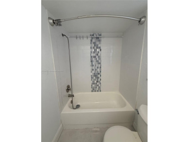 Beautifully upgraded 1 bedroom 1 bath  condo with shaker on Sunrise Lakes Phase III in Florida - for sale on GolfHomes.com, golf home, golf lot
