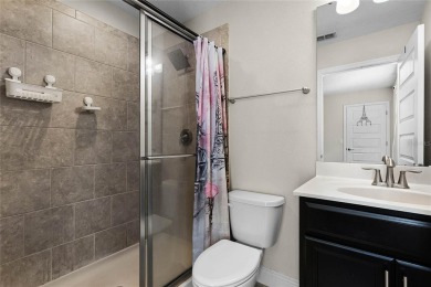 Stunning 4BD/3.5BA Pool Home with Tesla Solar System on an on Orange County National Golf Center and Lodge in Florida - for sale on GolfHomes.com, golf home, golf lot