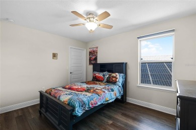 Stunning 4BD/3.5BA Pool Home with Tesla Solar System on an on Orange County National Golf Center and Lodge in Florida - for sale on GolfHomes.com, golf home, golf lot