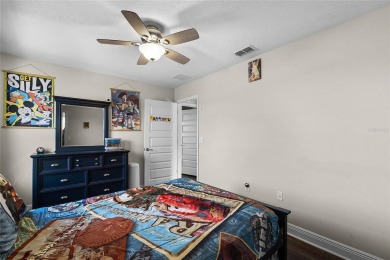 Stunning 4BD/3.5BA Pool Home with Tesla Solar System on an on Orange County National Golf Center and Lodge in Florida - for sale on GolfHomes.com, golf home, golf lot