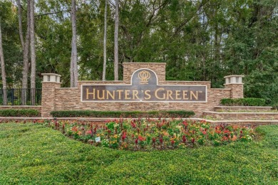 Under contract-accepting backup offers. Charming 3 bedroom, 2 on Hunters Green Country Club in Florida - for sale on GolfHomes.com, golf home, golf lot