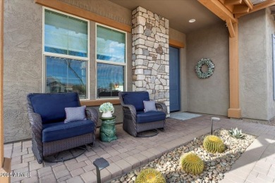 Take in the spectacular views of the mountains and the golf on Verrado Golf Club - Victory in Arizona - for sale on GolfHomes.com, golf home, golf lot