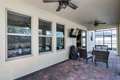 Stunning 4BD/3.5BA Pool Home with Tesla Solar System on an on Orange County National Golf Center and Lodge in Florida - for sale on GolfHomes.com, golf home, golf lot