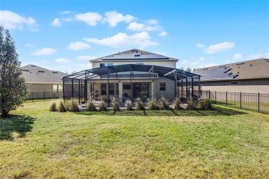 Stunning 4BD/3.5BA Pool Home with Tesla Solar System on an on Orange County National Golf Center and Lodge in Florida - for sale on GolfHomes.com, golf home, golf lot
