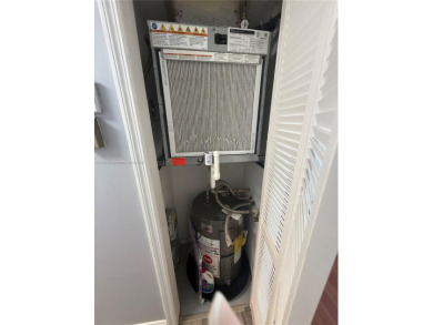Beautifully upgraded 1 bedroom 1 bath  condo with shaker on Sunrise Lakes Phase III in Florida - for sale on GolfHomes.com, golf home, golf lot
