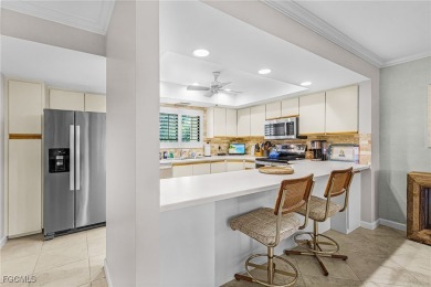 Discover this inviting 2nd floor end unit in Carriedale Gardens on  in Florida - for sale on GolfHomes.com, golf home, golf lot