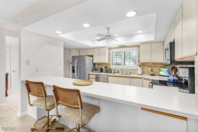 Discover this inviting 2nd floor end unit in Carriedale Gardens on  in Florida - for sale on GolfHomes.com, golf home, golf lot