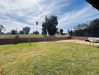 This impressive 3-bedroom home has been expertly remodeled and on Cocopah Rio Colorado Golf Course in Arizona - for sale on GolfHomes.com, golf home, golf lot