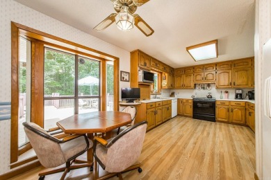 Welcome to your dream home nestled on a quiet, tree-lined on Indian Hills Country Club in Arkansas - for sale on GolfHomes.com, golf home, golf lot