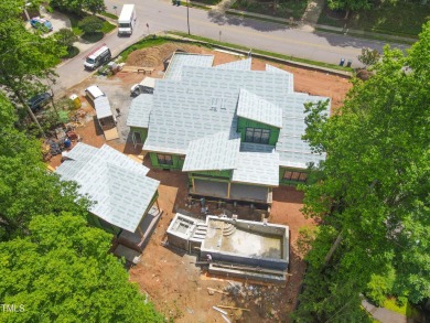 Stunning Luxury Home and Pool house on NRCC 9th Fairway of the on North Ridge Country Club in North Carolina - for sale on GolfHomes.com, golf home, golf lot