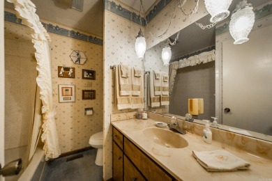 Welcome to your dream home nestled on a quiet, tree-lined on Indian Hills Country Club in Arkansas - for sale on GolfHomes.com, golf home, golf lot