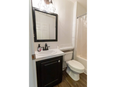 Welcome to this charming 2-bedroom, 2-bathroom manufactured home on Lily Lake Golf and RV Resort in Florida - for sale on GolfHomes.com, golf home, golf lot