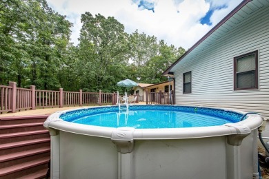 Welcome to your dream home nestled on a quiet, tree-lined on Indian Hills Country Club in Arkansas - for sale on GolfHomes.com, golf home, golf lot
