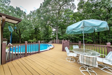 Welcome to your dream home nestled on a quiet, tree-lined on Indian Hills Country Club in Arkansas - for sale on GolfHomes.com, golf home, golf lot