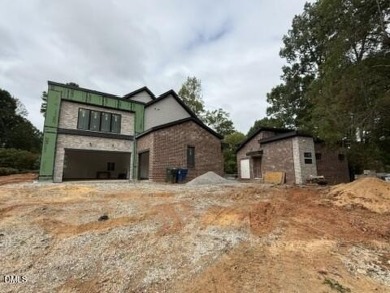 Stunning Luxury Home and Pool house on NRCC 9th Fairway of the on North Ridge Country Club in North Carolina - for sale on GolfHomes.com, golf home, golf lot