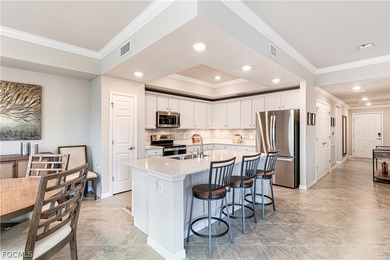 Step into a residence where style, comfort, and seamless design on Pelican Preserve Golf Club in Florida - for sale on GolfHomes.com, golf home, golf lot