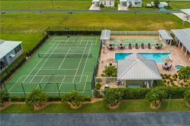 Welcome to this charming 2-bedroom, 2-bathroom manufactured home on Lily Lake Golf and RV Resort in Florida - for sale on GolfHomes.com, golf home, golf lot