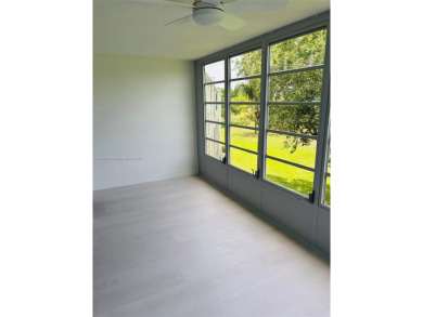 Contemporary designpletely renovated turnkey beautiful 1 bed 1.5 on Hillsboro Pines Golf in Florida - for sale on GolfHomes.com, golf home, golf lot