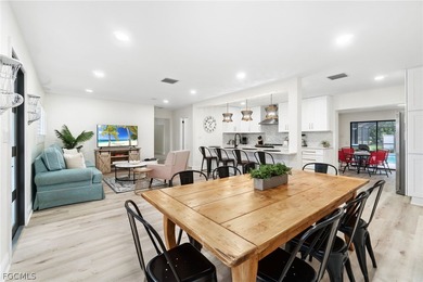 This fully updated pool home offers the space, flexibility, and on Raptor Bay Golf Club in Florida - for sale on GolfHomes.com, golf home, golf lot