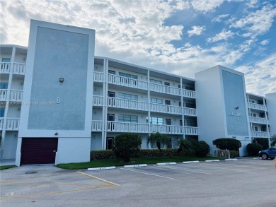 Contemporary designpletely renovated turnkey beautiful 1 bed 1.5 on Hillsboro Pines Golf in Florida - for sale on GolfHomes.com, golf home, golf lot