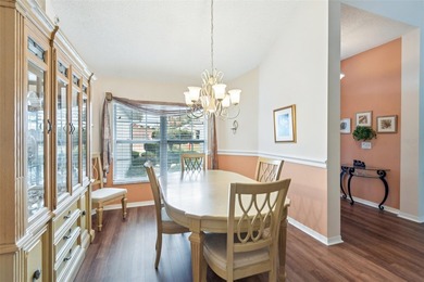 Experience the pinnacle of golf course living in this on Caloosa Greens Executive Golf Course in Florida - for sale on GolfHomes.com, golf home, golf lot