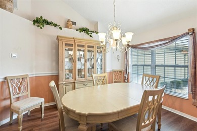 Experience the pinnacle of golf course living in this on Caloosa Greens Executive Golf Course in Florida - for sale on GolfHomes.com, golf home, golf lot