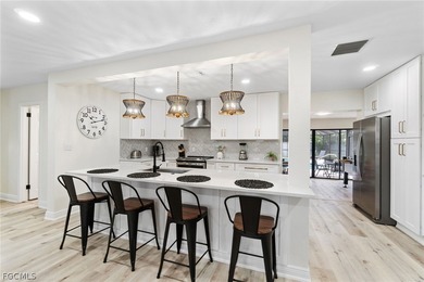 This fully updated pool home offers the space, flexibility, and on Raptor Bay Golf Club in Florida - for sale on GolfHomes.com, golf home, golf lot