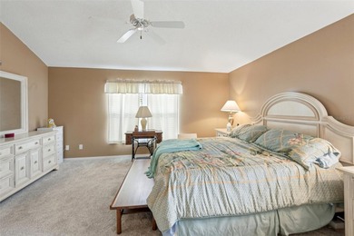 Experience the pinnacle of golf course living in this on Caloosa Greens Executive Golf Course in Florida - for sale on GolfHomes.com, golf home, golf lot