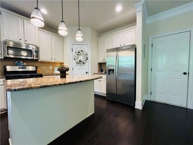 This home has it all! Situated on a beautifully landscaped level on Chateau Elan Golf Club  in Georgia - for sale on GolfHomes.com, golf home, golf lot
