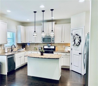 This home has it all! Situated on a beautifully landscaped level on Chateau Elan Golf Club  in Georgia - for sale on GolfHomes.com, golf home, golf lot