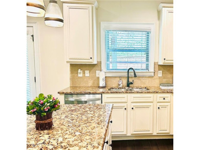 This home has it all! Situated on a beautifully landscaped level on Chateau Elan Golf Club  in Georgia - for sale on GolfHomes.com, golf home, golf lot