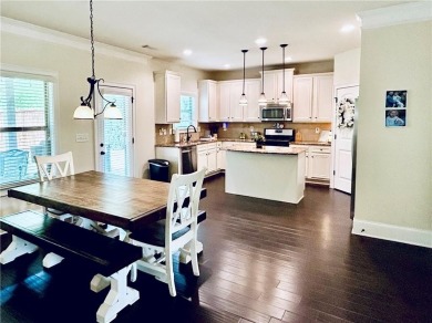 This home has it all! Situated on a beautifully landscaped level on Chateau Elan Golf Club  in Georgia - for sale on GolfHomes.com, golf home, golf lot