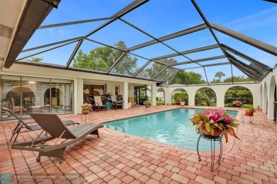 *** DISCOVER UNPARALLELED ELEGANCE NESTLED ON OVER HALF AN ACRE on Country Club of Coral Springs in Florida - for sale on GolfHomes.com, golf home, golf lot