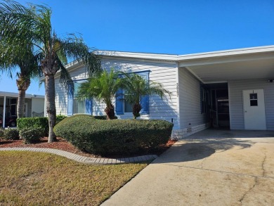 This 2 bedroom, 2 bath has approximately 1000 feet of living on Southport Springs Golf Club in Florida - for sale on GolfHomes.com, golf home, golf lot