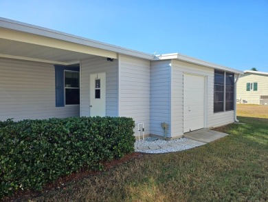 This 2 bedroom, 2 bath has approximately 1000 feet of living on Southport Springs Golf Club in Florida - for sale on GolfHomes.com, golf home, golf lot