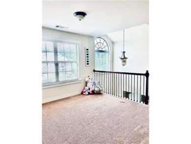 This home has it all! Situated on a beautifully landscaped level on Chateau Elan Golf Club  in Georgia - for sale on GolfHomes.com, golf home, golf lot