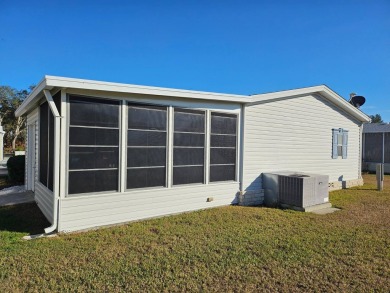 This 2 bedroom, 2 bath has approximately 1000 feet of living on Southport Springs Golf Club in Florida - for sale on GolfHomes.com, golf home, golf lot