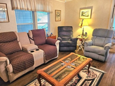 This 2 bedroom, 2 bath has approximately 1000 feet of living on Southport Springs Golf Club in Florida - for sale on GolfHomes.com, golf home, golf lot