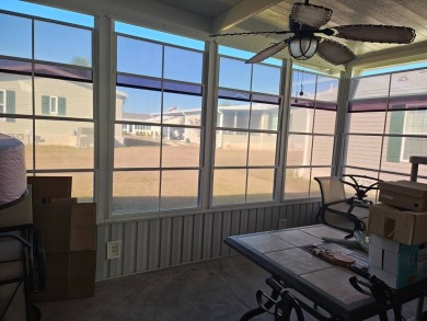 This 2 bedroom, 2 bath has approximately 1000 feet of living on Southport Springs Golf Club in Florida - for sale on GolfHomes.com, golf home, golf lot