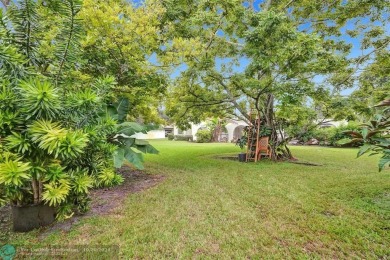 *** DISCOVER UNPARALLELED ELEGANCE NESTLED ON OVER HALF AN ACRE on Country Club of Coral Springs in Florida - for sale on GolfHomes.com, golf home, golf lot