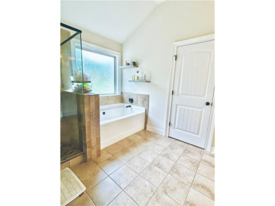 This home has it all! Situated on a beautifully landscaped level on Chateau Elan Golf Club  in Georgia - for sale on GolfHomes.com, golf home, golf lot