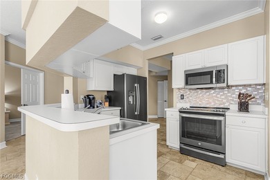 Welcome to this beautifully maintained condo offering serene on Spanish Wells Golf and Country Club in Florida - for sale on GolfHomes.com, golf home, golf lot