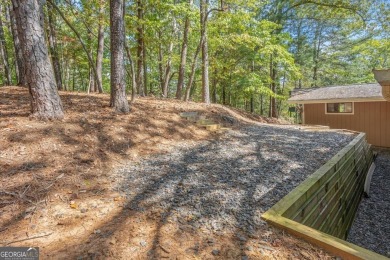 Home and 4 additional lots in tranquil Lake Arrowhead Retreat on The Highlands Course at Lake Arrowhead in Georgia - for sale on GolfHomes.com, golf home, golf lot