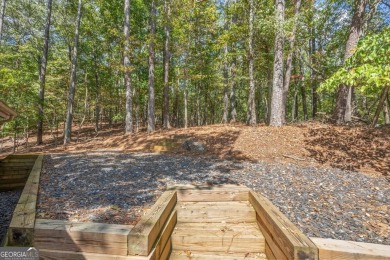 Home and 4 additional lots in tranquil Lake Arrowhead Retreat on The Highlands Course at Lake Arrowhead in Georgia - for sale on GolfHomes.com, golf home, golf lot