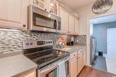Welcome to Edgewater 513, a rare ground-floor ICW condo located on Barefoot Resort and Golf Club  in South Carolina - for sale on GolfHomes.com, golf home, golf lot