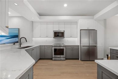 Located in Les Chateaux within the prestigious Pelican Marsh on Pelican Marsh Golf Club in Florida - for sale on GolfHomes.com, golf home, golf lot